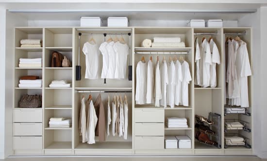 Custom wardrobe internals with velvet-lined drawer organisers